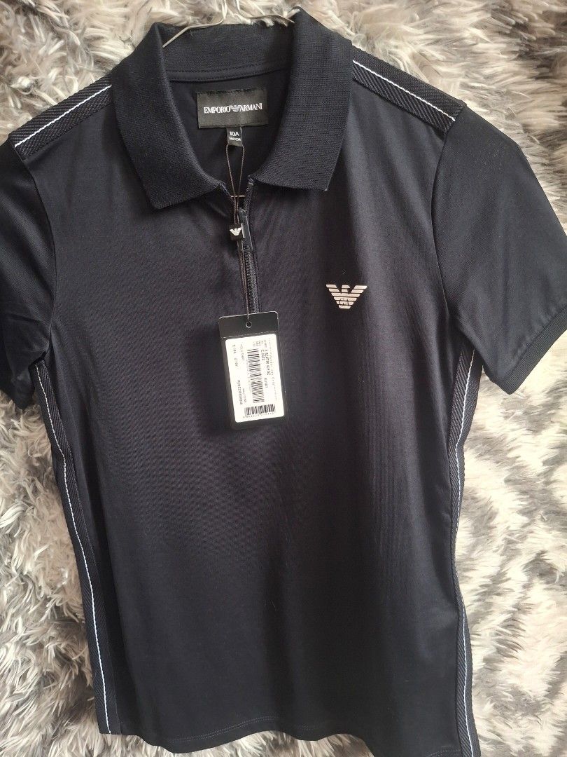 Emporio Armani (Category: Babies & Kids Fashion) located in Bulacan. Submitted by stacksonracks_ph (Listing ID 1390511994, Image 1). Description: Color: Black Length: 21 inches Width: 15.5 inches Sleeve length: 7 inches.
