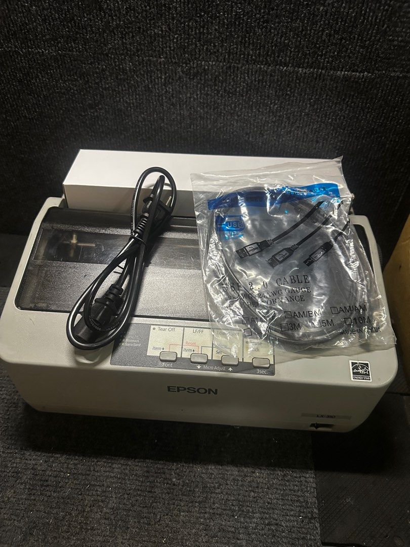 epson LX-310 (Category: Printers, Scanners & Copiers) located in Makati City. Submitted by jtechs (Listing ID 1390553415, Image 2). Description: in good running condition epson lx310 dotmatrix printer 9pins with usb cord power cord and new ribbon.