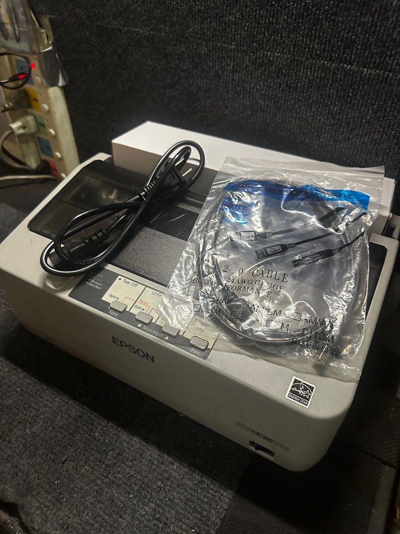 epson LX-310 (Category: Printers, Scanners & Copiers) located in Makati City. Submitted by jtechs (Listing ID 1390553415, Image 3). Description: in good running condition epson lx310 dotmatrix printer 9pins with usb cord power cord and new ribbon.