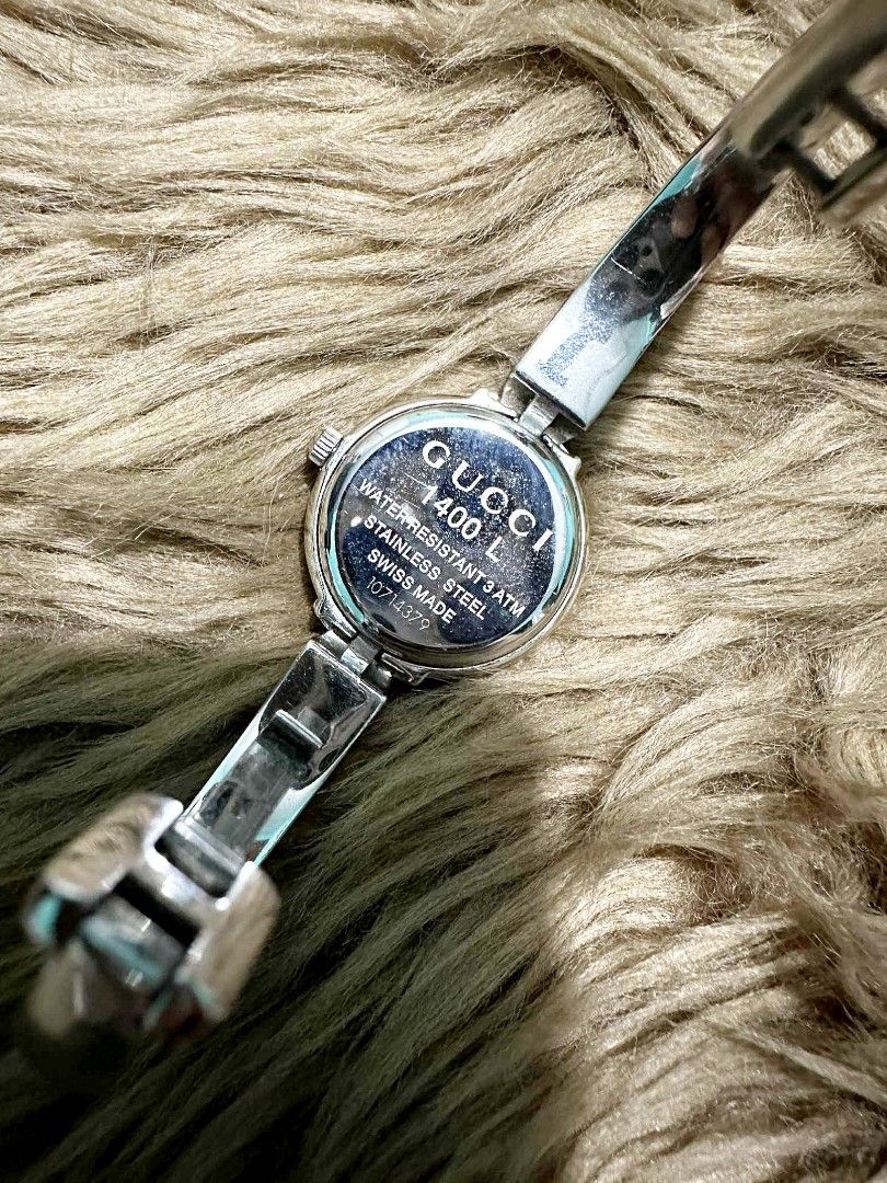 Gucci bangle womens watch (Category: Luxury Watches) located in Caloocan City. Submitted by divasbysam (Listing ID 1390548368, Image 3). Description: Brand: Gucci Model: 1400L Movement: Quartz Case Material: Stainless Steel Case Size: Approximately 25 mm Dial: Goal Crystal: Scratch-resistant sapphire crystal Water Resistance: 3 ATM (30 meters) Band Type: Stainless steel bangle Display: Analog 📌No free shipping 📌No COD 📌Delivery c/o buyer 📌 Lo
