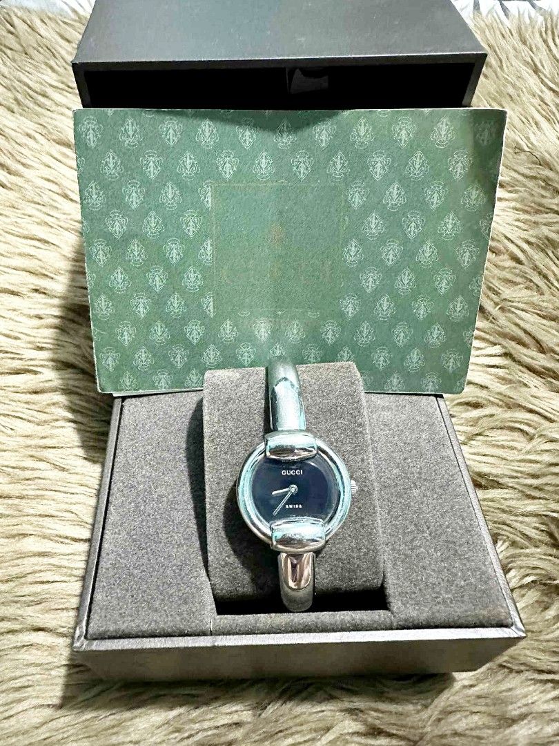 Gucci bangle womens watch (Category: Luxury Watches) located in Caloocan City. Submitted by divasbysam (Listing ID 1390548368, Image 1). Description: Brand: Gucci Model: 1400L Movement: Quartz Case Material: Stainless Steel Case Size: Approximately 25 mm Dial: Goal Crystal: Scratch-resistant sapphire crystal Water Resistance: 3 ATM (30 meters) Band Type: Stainless steel bangle Display: Analog 📌No free shipping 📌No COD 📌Delivery c/o buyer 📌 Lo