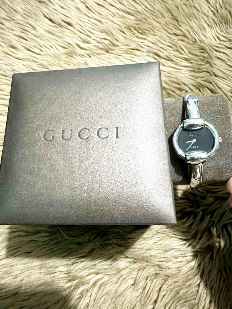 Gucci bangle womens watch (Category: Luxury Watches) located in Caloocan City. Submitted by divasbysam (Listing ID 1390548368, Image 2). Description: Brand: Gucci Model: 1400L Movement: Quartz Case Material: Stainless Steel Case Size: Approximately 25 mm Dial: Goal Crystal: Scratch-resistant sapphire crystal Water Resistance: 3 ATM (30 meters) Band Type: Stainless steel bangle Display: Analog 📌No free shipping 📌No COD 📌Delivery c/o buyer 📌 Lo
