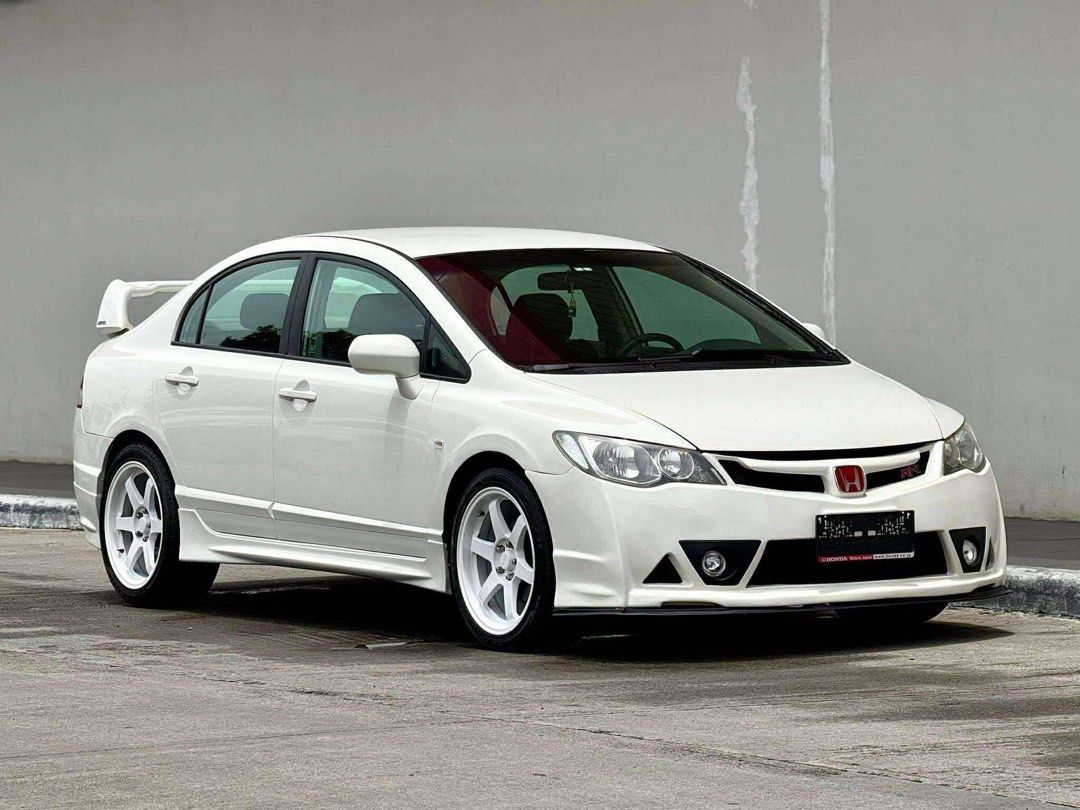 Honda Civic Mugen RR Inspired Auto (Category: Used Cars) located in Manila. Submitted by quality_cars (Listing ID 1390458234, Image 2). Description: FOR SALE! Honda Civic Mugen RR Inspired 2008 AT 1.8S Automatic transmission Mugen RR Inspired 100,000 mileage Newly wash over (Taffeta White) 18s Rota w/ thick tires Brand new body kits Brand new emblems Newly exterior detail Newly interior detail Newly replaced spark plugs Newly replaced coils (4pcs