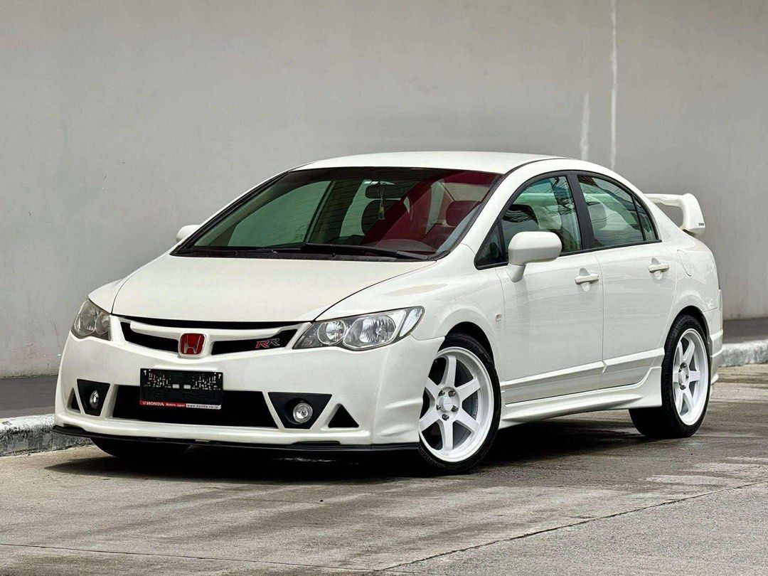 Honda Civic Mugen RR Inspired Auto (Category: Used Cars) located in Manila. Submitted by quality_cars (Listing ID 1390458234, Image 3). Description: FOR SALE! Honda Civic Mugen RR Inspired 2008 AT 1.8S Automatic transmission Mugen RR Inspired 100,000 mileage Newly wash over (Taffeta White) 18s Rota w/ thick tires Brand new body kits Brand new emblems Newly exterior detail Newly interior detail Newly replaced spark plugs Newly replaced coils (4pcs