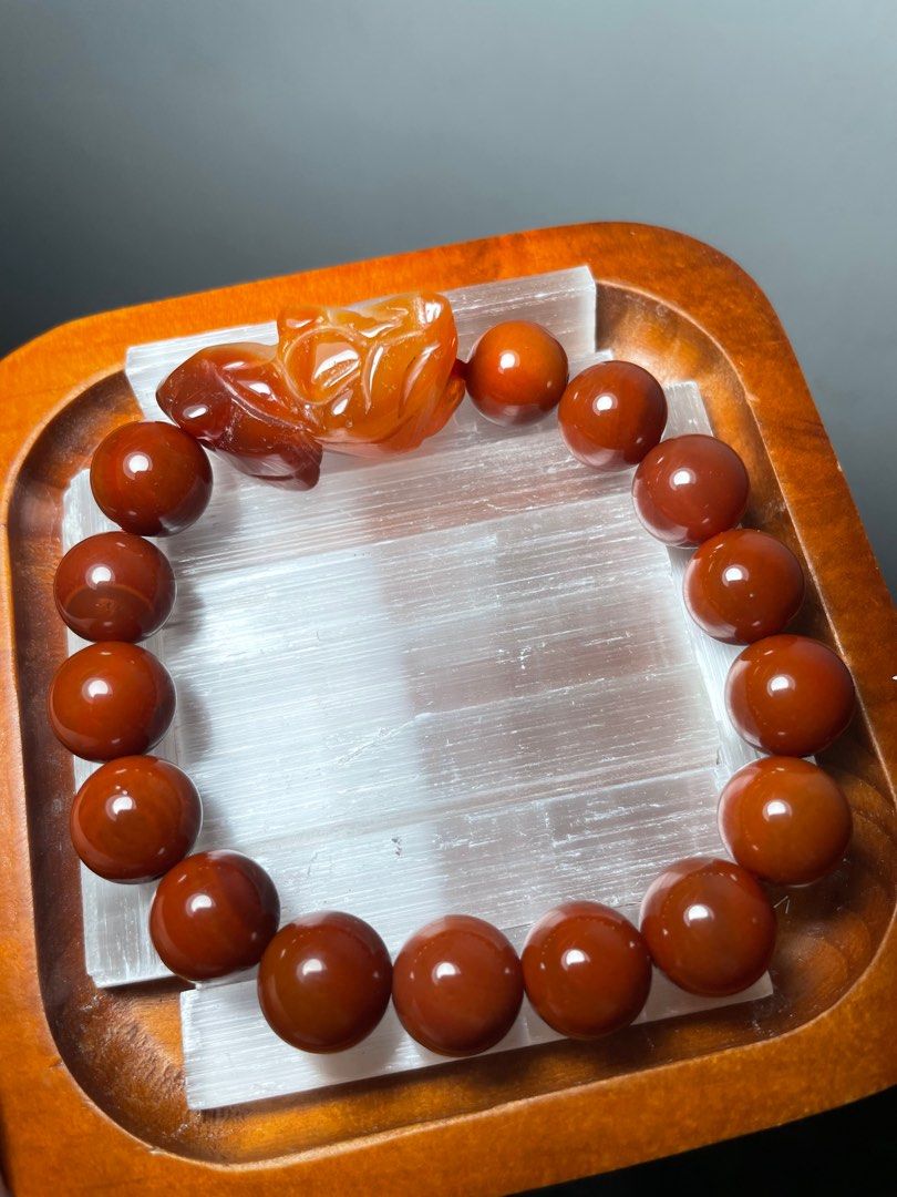 Nanhong Agate Full Meat with Red Agate Snake Charm (Category: Bracelets) located in Meycauayan. Submitted by aura_haus (Listing ID 1390583109, Image 1). Description: 12mm bead size Can fit 17cm (with extra 2 beads) .