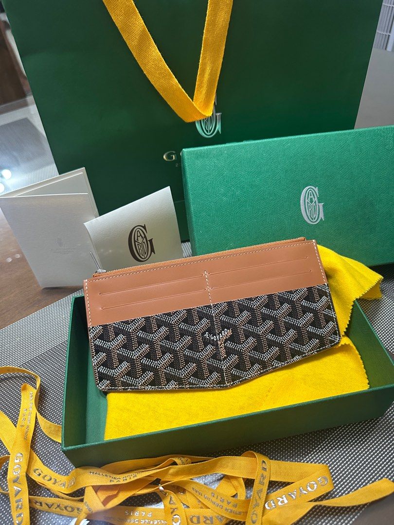 RUSH New Authentic Goyard Insert Louise Black Tan (Category: Luxury Bags & Wallets) located in Quezon City. Submitted by aprillovestoshop (Listing ID 1390589119, Image 1). Description: SALE! New unused! Authentic Goyard Insert Louise in black/tan. Comes with paperbag, box, felt cloth, booklets. Bought 2025. Bills can fit, with lots of card slots! Front and back. Perfect gift idea! Selling low!.