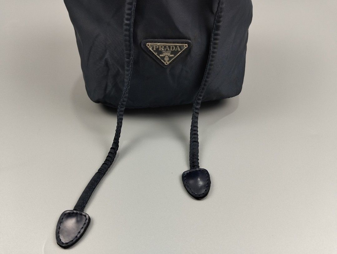 PRADA mini bucket bag (Category: Luxury Bags & Wallets) located in Bulacan. Submitted by recycloth_ (Listing ID 1390565089, Image 2). Description: PRADA mini bucket bag navy made in italy in great condition no issue no flaws HMU!.