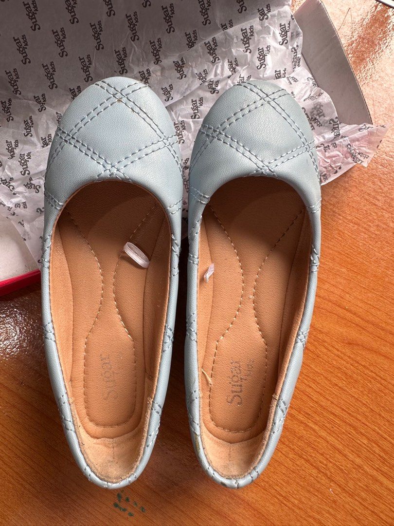 Preloved: SUGAR KIDS DOLL SHOES (Category: Babies & Kids Fashion) located in Makati City. Submitted by amrojo (Listing ID 1390507936, Image 1). Description: 💡Decluttering my LO’s outgrown things. 💡 Makati location, for pickup. 💡 Payment via Gcash, no COD. Preloved (used but not abused), size 11 (TODDLER), Sky Blue, with box. Please note little scratch at the back of the right shoe. .