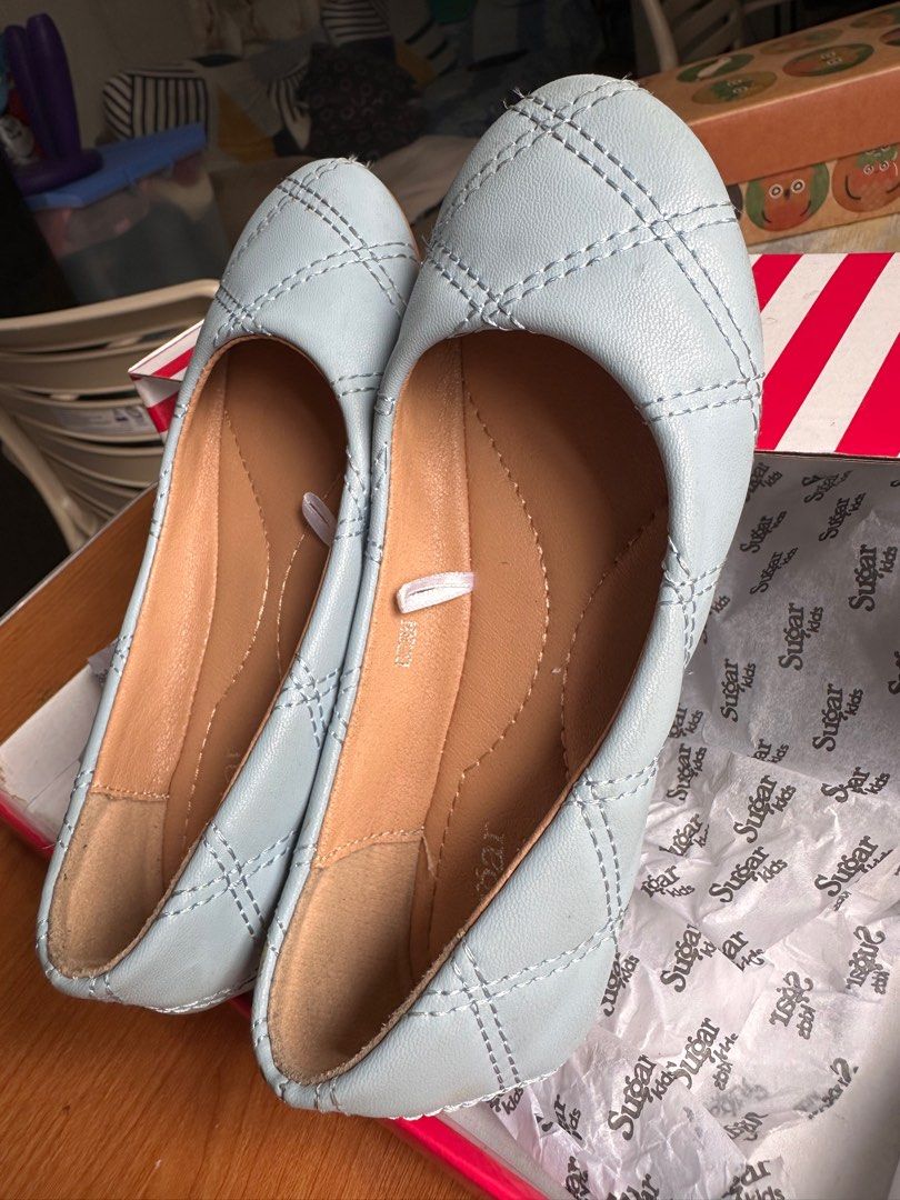 Preloved: SUGAR KIDS DOLL SHOES (Category: Babies & Kids Fashion) located in Makati City. Submitted by amrojo (Listing ID 1390507936, Image 3). Description: 💡Decluttering my LO’s outgrown things. 💡 Makati location, for pickup. 💡 Payment via Gcash, no COD. Preloved (used but not abused), size 11 (TODDLER), Sky Blue, with box. Please note little scratch at the back of the right shoe. .