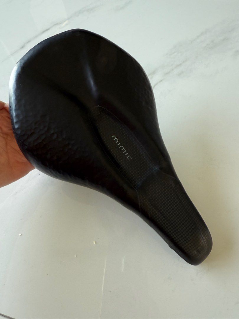 Specialized Power Mimic Saddle (Category: Parts & Accessories) located in Singapore. Submitted by angeline8228 (Listing ID 1390422112, Image 3). Description: - Specialized Power Mimic saddle - Size 143mm weight 213g - Suitable for road bikes - Lightweight and durable hollow titanium rails - Level 2 padding: Medium density foam for bike feel with additional cushioning. - Still functional and comfortable.