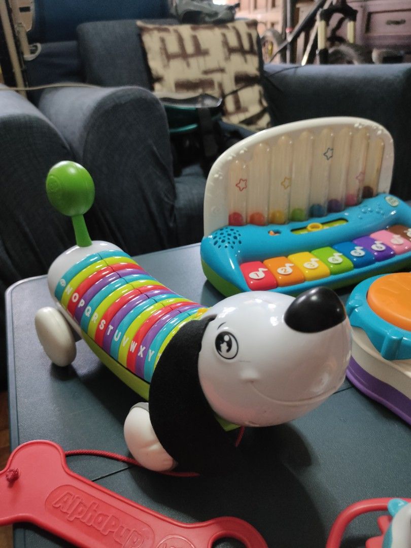 TAKE ALL! Leap Frog toys (Category: Infant Playtime) located in Manila. Submitted by anneesp (Listing ID 1390469139, Image 3). Description: Various Leap Frog battery operated toys Flaws: signs of usages Functionality: All are still functioning, except for the last 3 keys of the toy dog RFS: Decluttering and outgrown. DM me for videos #infanttoys #toddlertoys #leapfrog #leapfrogtoys #batteryoperatedtoys #toys #toysforbabies.