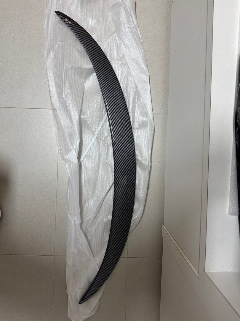 Universal Rear Diffuser (Category: Bodykits & Styling) located in Singapore. Submitted by j-house (Listing ID 1390540576, Image 2). Description: Universal Rear Diffuser for different car brands . (Carbon Fiber design) Newly bought, totally new. .