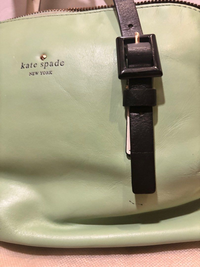 Vintage Kate Spade Dumpling Bag (Category: Luxury Bags & Wallets) located in Manila. Submitted by clearmyclosetmnl (Listing ID 1390589812, Image 3). Description: This authentic, mint colored, two-way Kate Spade Waverly bag was bought ten years ago. The top handle strap of the bag is reversible, and can be worn either in black or white. There is minor cracking with the long strap, but the top handle straps are still intact. .