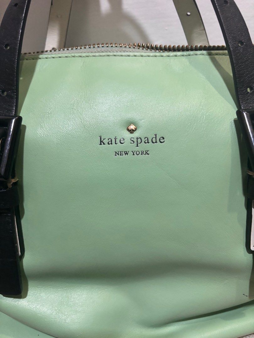 Vintage Kate Spade Dumpling Bag (Category: Luxury Bags & Wallets) located in Manila. Submitted by clearmyclosetmnl (Listing ID 1390589812, Image 2). Description: This authentic, mint colored, two-way Kate Spade Waverly bag was bought ten years ago. The top handle strap of the bag is reversible, and can be worn either in black or white. There is minor cracking with the long strap, but the top handle straps are still intact. .