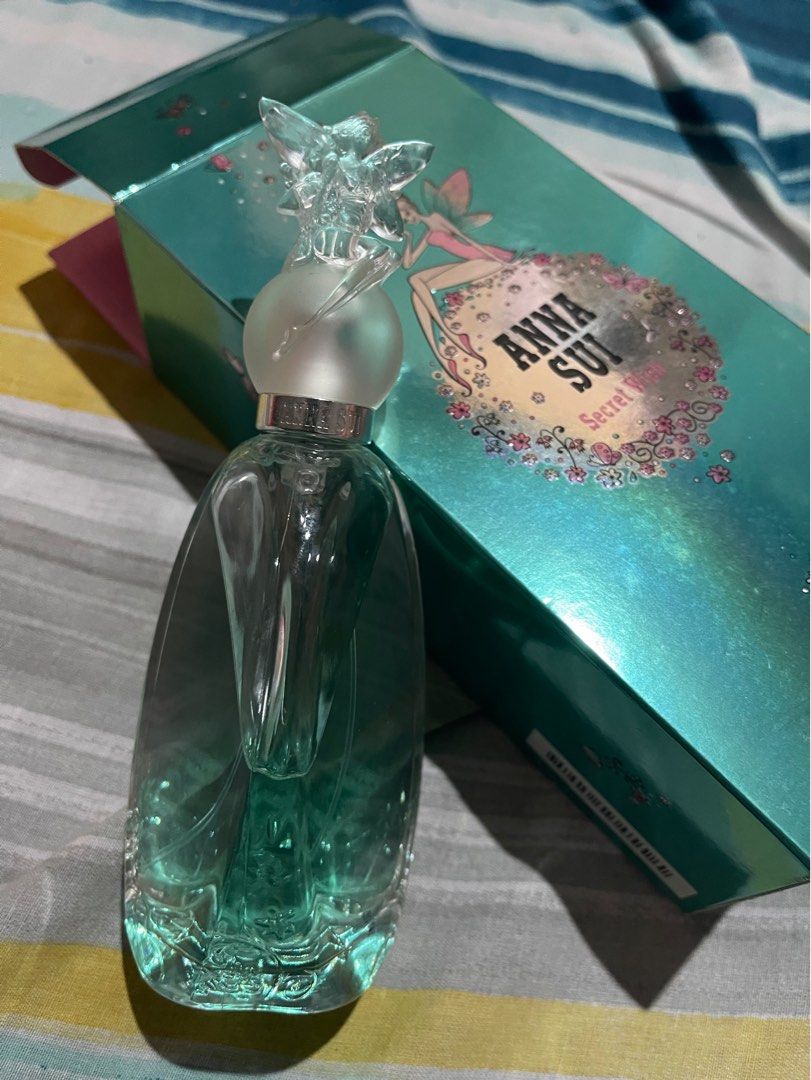 Anna Sui Secret Wish Perfume EDT (Category: Fragrance & Deodorants) located in Manila. Submitted by declutterpony (Listing ID 1395622098, Image 1). Description: My Mom got this as a gift pero hindi siya mahilig mag-perfume, gusto niya raw ibenta haha Sprayed once or twice lang. Box has minimal dents but barely noticeable. Price slightly negotiable, but this is the lowest price in the market I promise you..
