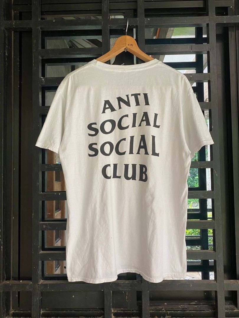 Anti Social Social Club White Tee (Category: Tshirts & Polo Shirts ) located in Sariaya. Submitted by hnw_19 (Listing ID 1395548981, Image 1). Description: - White t-shirt - Features "ANTI SOCIAL SOCIAL CLUB" print on the back - Classic crew neck design - Made from comfortable cotton fabric.