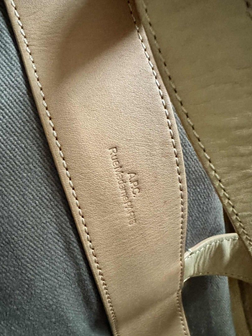 A.P.C. Rue Madame Paris Bag (Category: Luxury Bags & Wallets) located in Mandaluyong City. Submitted by j.alonso (Listing ID 1395582138, Image 3). Description: - A.P.C. bag - Canvas-like material in muted brown - Leather tag included - Tag features brand name and "rue Madame PARIS" embossing - Light tan leather tag Japan APC in almost new unused condition.