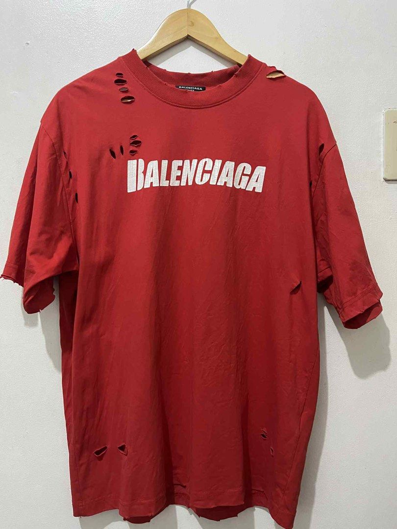 Balenciaga distressed shirt (Category: Luxury Apparel) located in Bacoor. Submitted by jampong0724 (Listing ID 1395562164, Image 1). Description: .