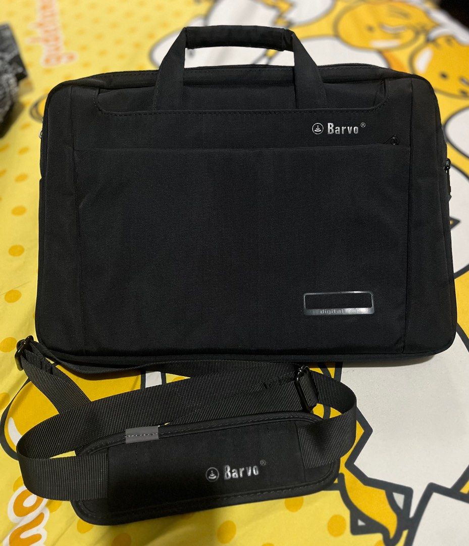 Barvo Laptop Bag with Shoulder Strap (Category: Laptop Bags & Sleeves) located in Angeles City. Submitted by goodbuysathome (Listing ID 1395652267, Image 1). Description: - Black Barvo 14”laptop bag - Includes a shoulder strap - Features multiple compartments - Interior pockets for organization - Top handle for carrying - Sleek, professional design - Adjustable shoulder strap Brndnew without tag Add shipping fee 104 Gcash payment Last price poste