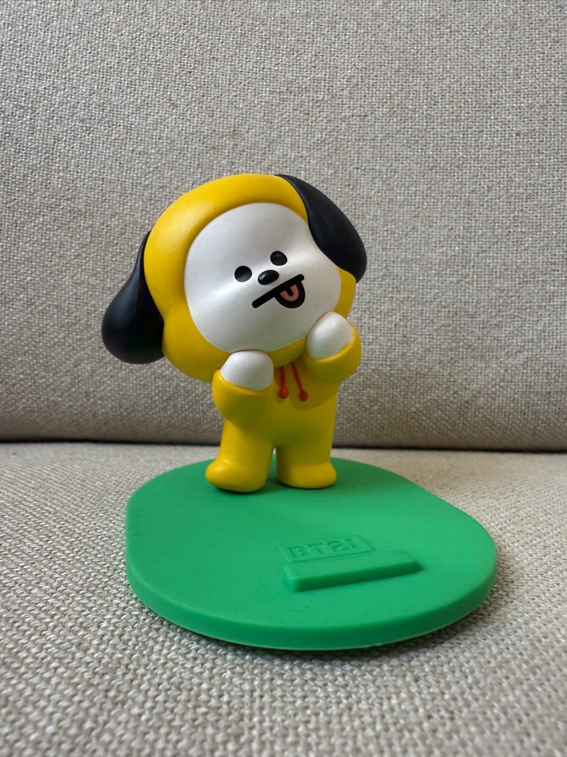 Chimmy Cellphone Stand (Category: Mounts & Holders) located in Quezon City. Submitted by stylesaverph (Listing ID 1395688352, Image 3). Description: - Chimmy cellphone stand. - Features a cute BT21 design. - Perfect for displaying your phone. - A great addition to any ARMY collection..