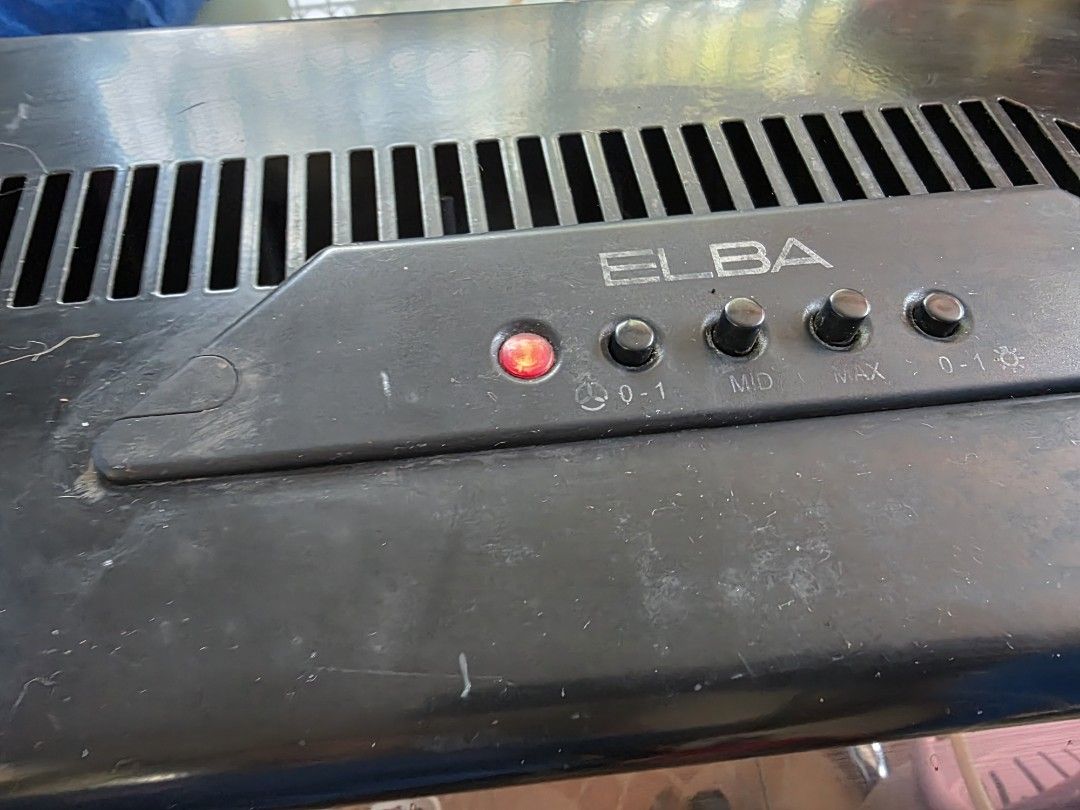Elba Range Hood (Category: Other Kitchen Appliances) located in Quezon City. Submitted by anakai (Listing ID 1395586088, Image 3). Description: Elba range hood with multiple control buttons. Features a built-in light. The hood has a black finish and a vent on the front. The control panel has the Elba logo and several buttons for different functions. pick up..pick up .