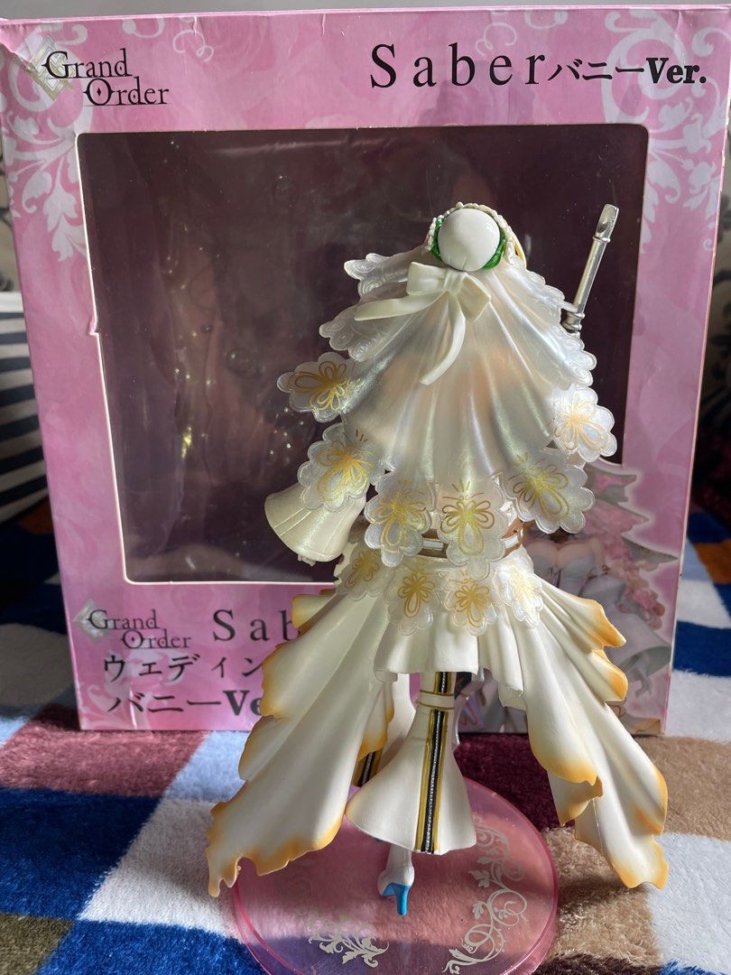 Fate / Grand Order Saber Nero Bride (Category: Figurines & Statues) located in Tiaong. Submitted by pengdwin (Listing ID 1395604713, Image 3). Description: - Bootleg - Includes base and large sword - Back in box Rfs: Decluttering .