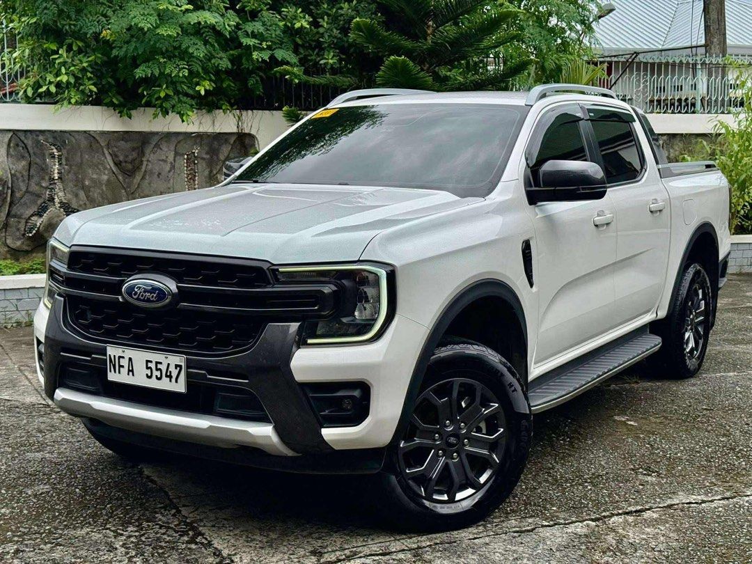 Ford Ranger Wildtrak 4x2 Auto (Category: Used Cars) located in Manila. Submitted by quality_cars (Listing ID 1395585563, Image 2). Description: FOR SALE‼️ 2023 Ford Ranger Wildtrak 4x2 1st owned Automatic 2.0L 4-Cylinder Bi-Turbo Diesel engine Apple CarPlay W/ Bedliner Cover W/ Comprehensive insurance 24,000km Casa Maintained Complete manual book Complete duplicate key Complete Papers Brand new Condition‼️ Price: 1,316,000 Location: Paranaque Cit