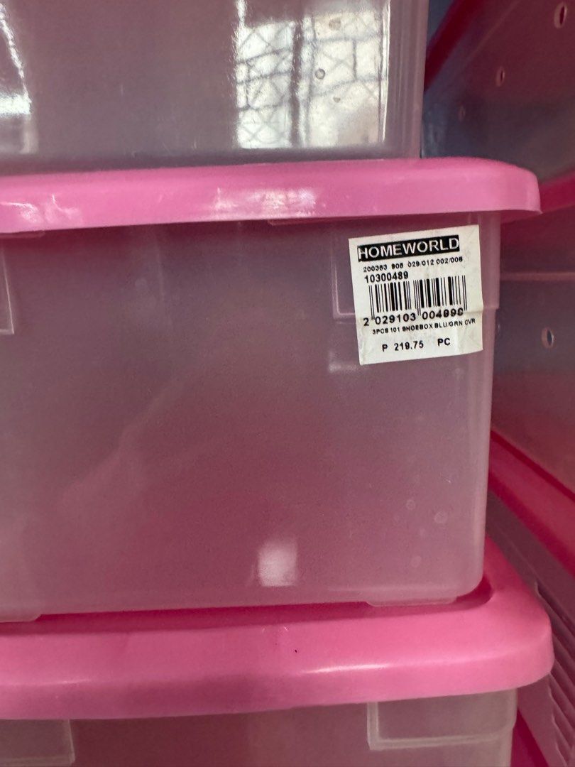 HomeWorld Shoe Box with Pink Lid (Category: Storage Boxes & Baskets) located in Batangas. Submitted by GDW98 (Listing ID 1395571323, Image 3). Description: - Clear plastic storage boxes - Pink lids - Rectangular shape - Approximately 30cm in length - Side holes for ventilation - Original price: ₱219.75 per box -selling low 85.00 per piece - take all for 3500.