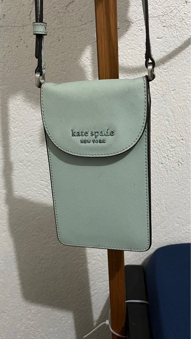 kate spade (Category: Luxury Bags & Wallets) located in Manila. Submitted by sunshower1232 (Listing ID 1395655080, Image 1). Description: Flap Cross Body Cellphone Bag -rare item & color (sage green) -ideal for smart phones -triple pocket -negotiable price for sure buyer.