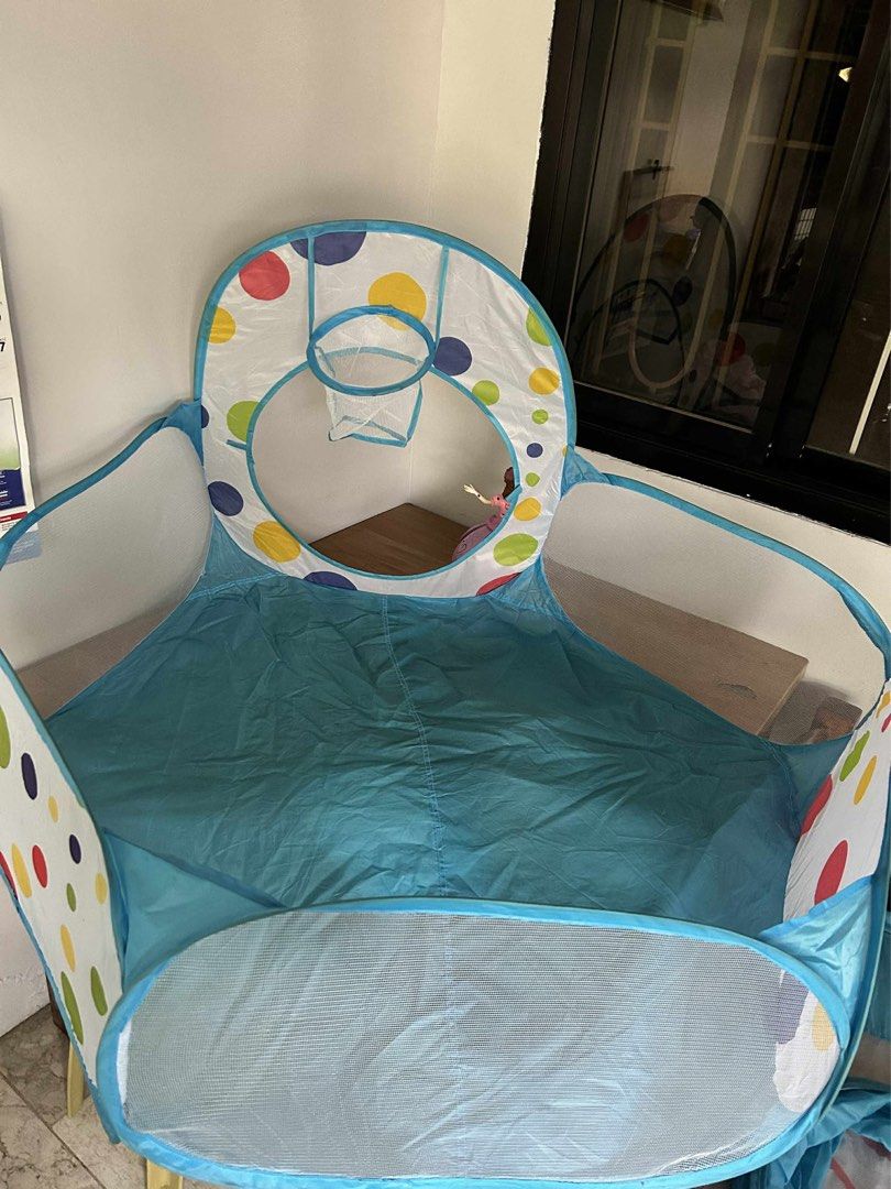 KIDOM 3-in-1 Pop Up Play Tent (Category: Infant Playtime) located in Manila. Submitted by domtuazon28088 (Listing ID 1395605607, Image 3). Description: - 3-in-1 design: Ball pool, tunnel, and tent - Features a basketball hoop - Colorful polka dot design - Suitable for indoor and outdoor use - Perfect for all seasons (spring, autumn, winter, summer) - Easy to set up - Provides a fun play space for kids.