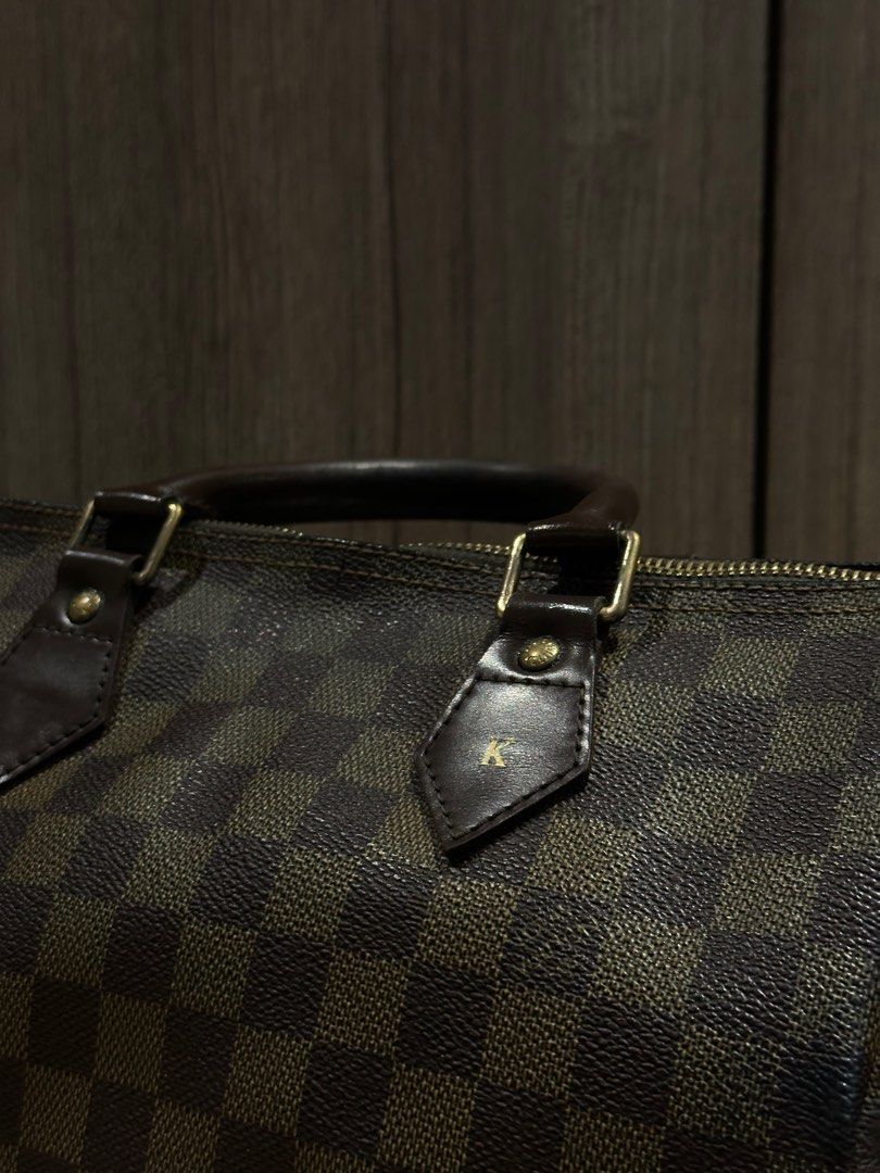 Louis Vitton Speedy (Category: Luxury Bags & Wallets) located in Quezon City. Submitted by mzrc1 (Listing ID 1395675371, Image 2). Description: Speedy LV Customized RFS not being used anymore Check last photo for stamp on bag Inclusions: Bag Price is negotiable Location: QC .