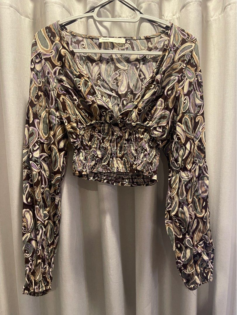 PULL&BEAR printed top (Category: Longsleeves) located in Las Pinas. Submitted by bfastclb (Listing ID 1395543439, Image 1). Description: - never used - s-semi m frame - dm for more info.