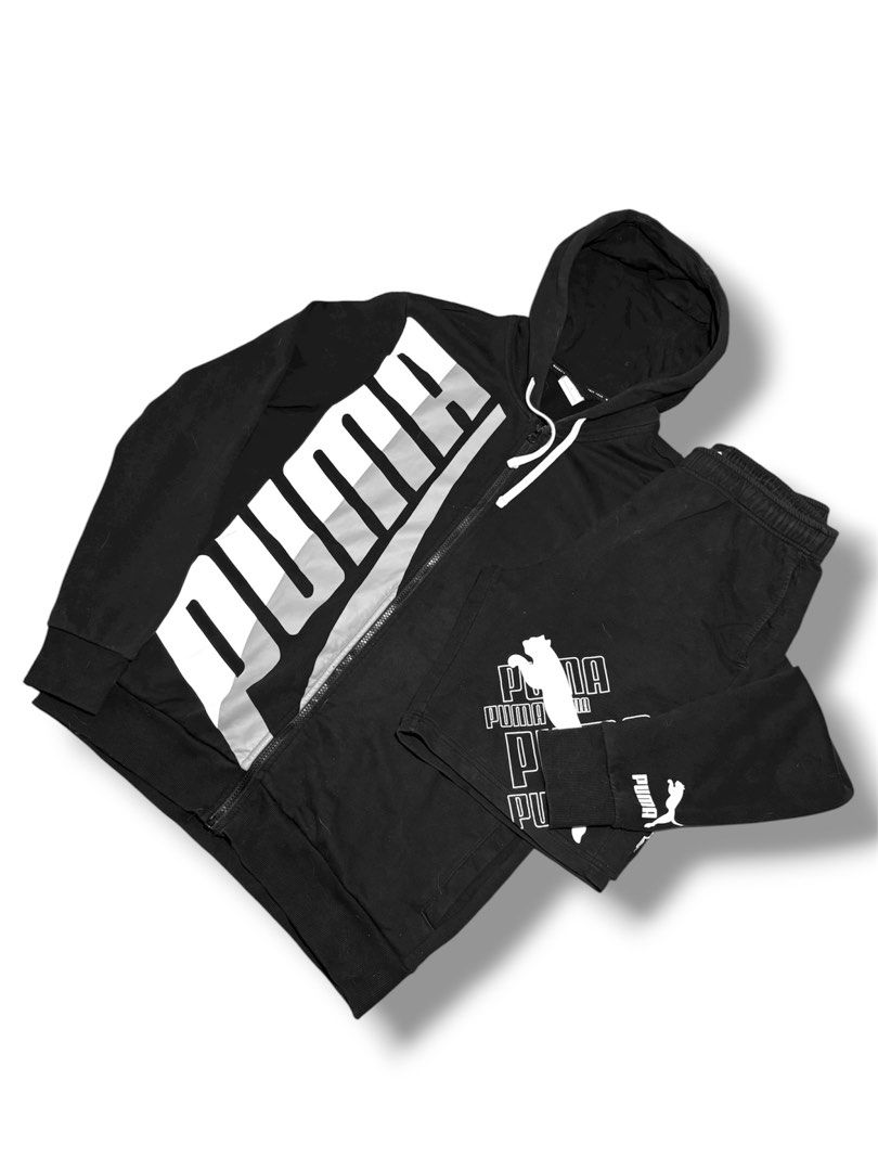Puma Tracksuit Set Black (Category: Sets & Coordinates) located in Calamba. Submitted by thrifthstlrs (Listing ID 1395607130, Image 1). Description: - Black Puma tracksuit set - Includes zip-up hoodie with Puma logo - Matching sweatshort with Puma logo - Hoodie features a drawstring hood - Made of comfortable material - Perfect for casual wear.