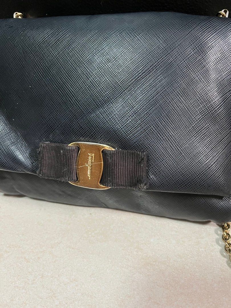 Salvatore Ferragamo sling bow bag (Category: Luxury Bags & Wallets) located in Quezon City. Submitted by bebegaze (Listing ID 1395592053, Image 2). Description: What you see is what you get so please look at the pictures closely. With flaws, signs of use since preloved. Ukay source. Please manage your expectations. Auto pass to all low ballers. Ask nicely please. .
