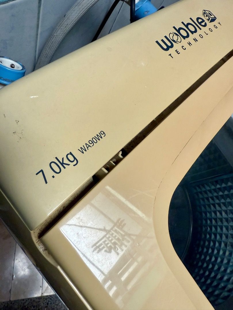 Samsung Wobble 7kg top load automatic washing machine (Category: Washing Machines and Dryers) located in Taguig. Submitted by denniscu (Listing ID 1395651497, Image 1). Description: Top load Automatic 7kg Working condition Minor repairs Pickup or Lalamove to your location.
