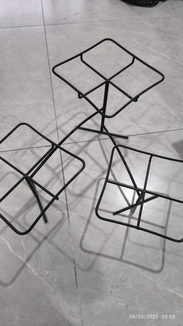 Square White Serving Plates with Metal Stands (Category: Dinnerware & Cutlery) located in Manila. Submitted by zachariesmanila (Listing ID 1395562286, Image 3). Description: - Set of 3 square white serving plates with black metal stands. - Simple and elegant design. - Ideal for appetizers, desserts, or small dishes. - Elevated presentation for parties, events, or everyday use. - Plates and stands included. 1 plate has been replaced. 2 other plate