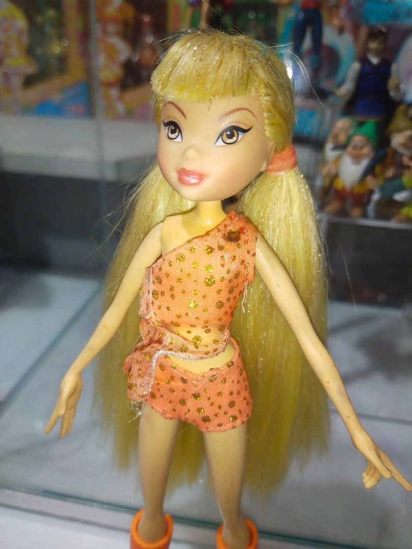 Winx club Stella charmix Doll (Category: Kids Toys) located in Baguio. Submitted by ems_collects (Listing ID 1395702290, Image 3). Description: no wings, headband, pigtails.