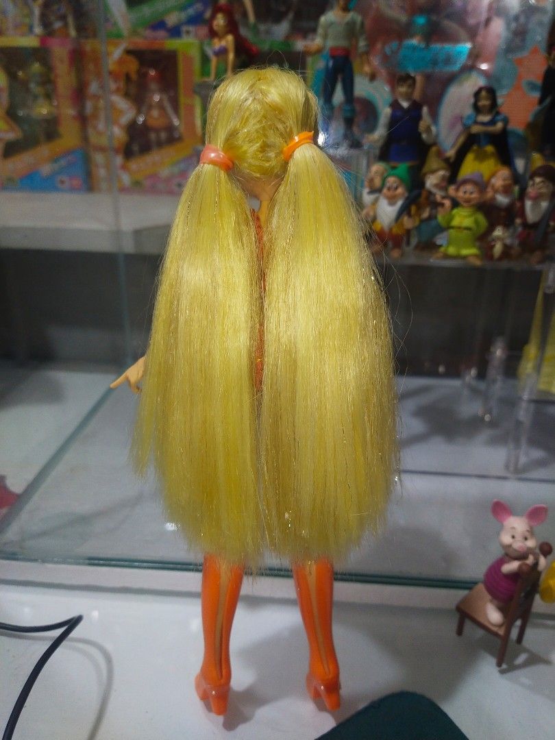 Winx club Stella charmix Doll (Category: Kids Toys) located in Baguio. Submitted by ems_collects (Listing ID 1395702290, Image 2). Description: no wings, headband, pigtails.