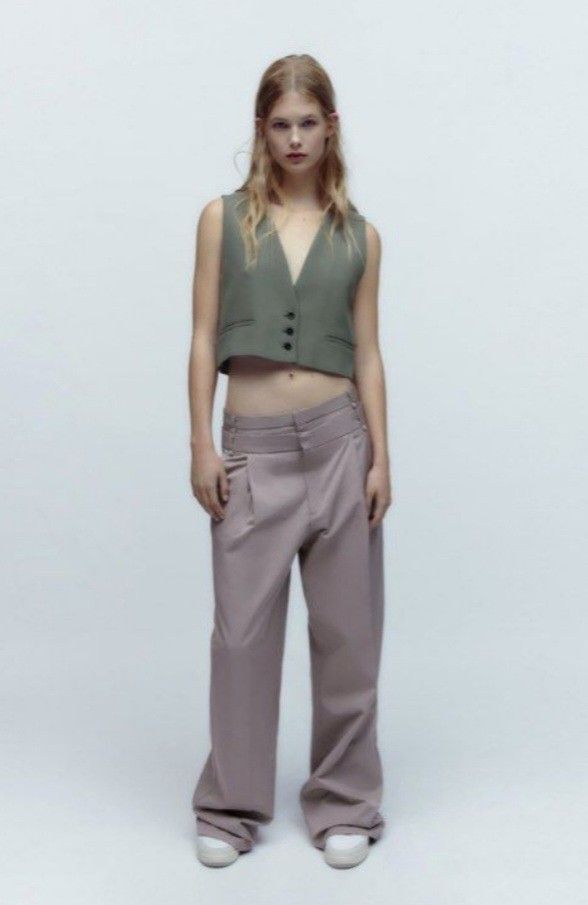 Zara double waistband trousers (Category: Other Bottoms) located in Santa Rosa. Submitted by chaneloberli.n (Listing ID 1395694344, Image 1). Description: - Beige color - Size XS - Relaxed fit - New with tags - Original price: ₱2,995.00 - Button and zipper closure - original seller had it altered -2cm at the waistband but still fits like xs zara (can be easily removed) - never used; too big for me - no ww - slightly negotiable waist: 13 in. lengt
