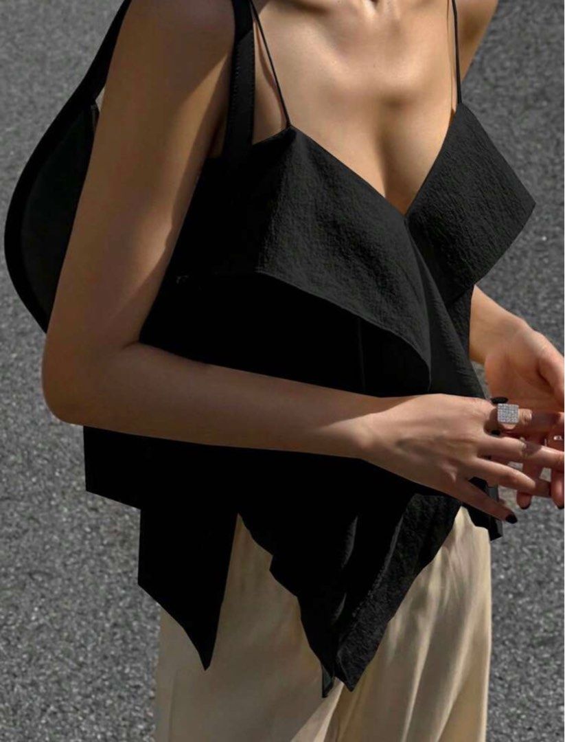 Casual Ruffle Sleeveless Top (Category: Sleeveless) located in Manila. Submitted by summerdeclutters (Listing ID 1390703699, Image 1). Description: - Black / XS - Worn once - Bought for 360 - Model is wearing M - Chill and pretty cute - Easy to style with anything. - The ruffle straps add a fun detail without being too much - Great basic with a lil extra - Open for negotiations! .
