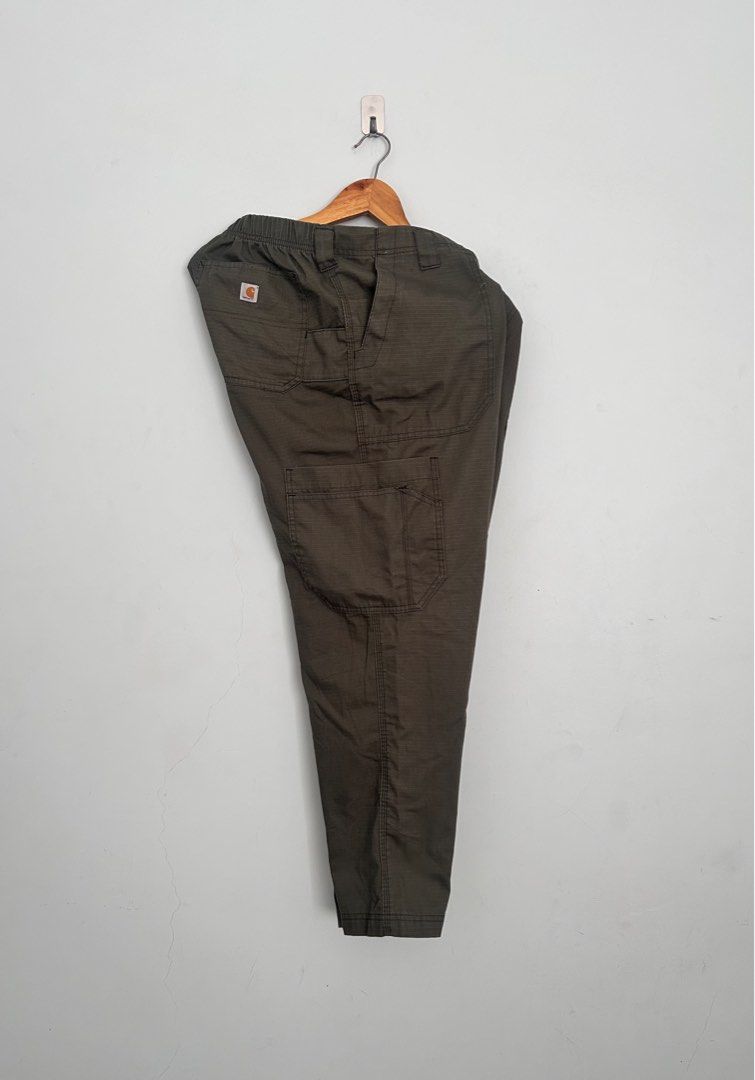 Carhartt Scrub 8 Pocket Pants (Category: Chinos) located in Cagayan de Oro. Submitted by aljay02 (Listing ID 1390720281, Image 1). Description: Carhartt Scrub Pants 8 Pocket Cargo Pants 36-38 37.5 Length Excellent Condition.