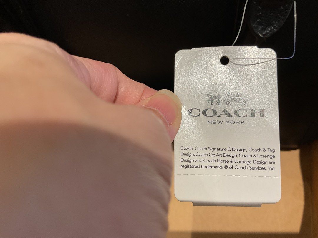 Coach small margot carryall black (Category: Luxury Bags & Wallets) located in Manila. Submitted by induljenceco (Listing ID 1390606359, Image 3). Description: With shoulder strap Please see picture for small damage inside Never used Still with tag.
