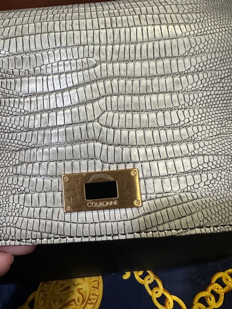 Couronne (Category: Luxury Bags & Wallets) located in Bocaue. Submitted by marianokriza21 (Listing ID 1390743582, Image 3). Description: Hardware minor issue (lock part due to usage) Preloved Still negotiable.