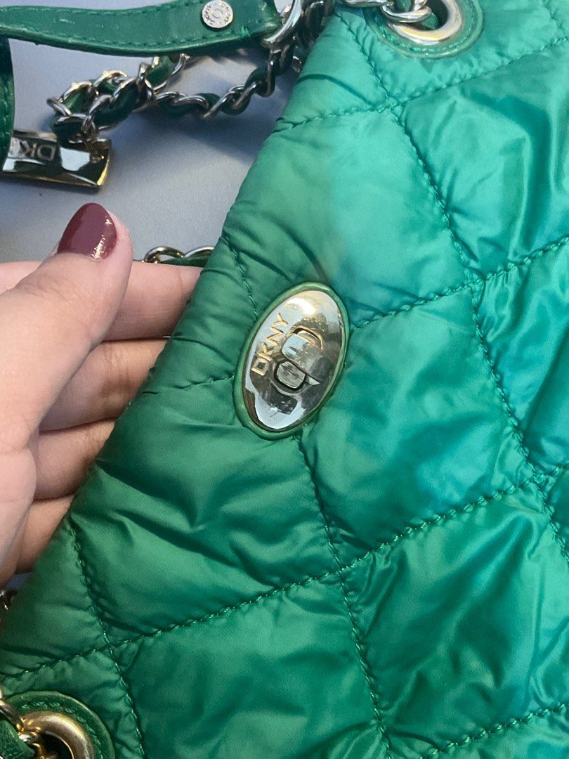DKNY GREEN CONVERTIBLE CHAIN BAG 💚 (Category: Cross-body Bags) located in Manila. Submitted by nduckling (Listing ID 1390717820, Image 3). Description: DKNY GREEN CROSS BODY/SHOULDER CHAIN BAG 💚 💚Nylon puffy bag 💚 Expect may signs of usage lang wala namang major major bakbak. Super cute ✨ RFS moving out declutter .