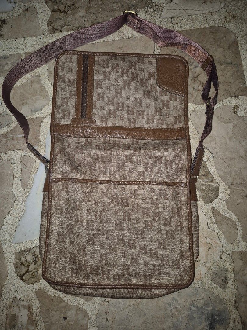 Hazzy mens sling (Category: Luxury Bags & Wallets) located in Quezon City. Submitted by gadgetsandstuffs.qc (Listing ID 1390745602, Image 3). Description: Hazzys mens sling brown leather water repellant combination med size intact rubber lining no crack no chopping with multiple compartment.