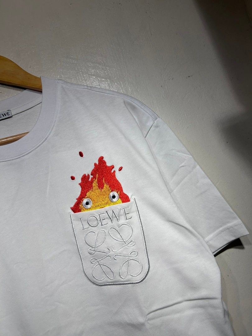 Loewe x Spiritted Away Pocket Tee. (Category: Tshirts & Polo Shirts ) located in Manila. Submitted by ardobe.mnl (Listing ID 1390718650, Image 2). Description: Loewe x Spiritted Away Pocket Tee. Size: Large Dimes: 22x28 Condition: Good asnew Flaw: None Dm for inquiries. 📥.