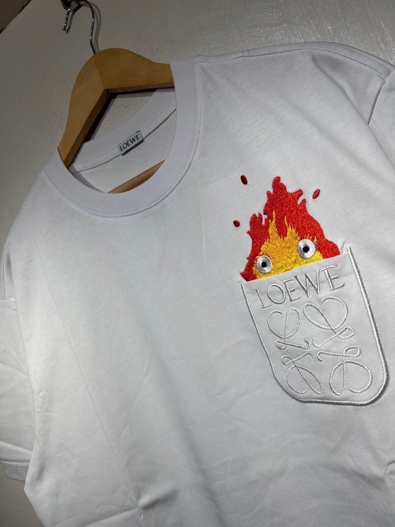 Loewe x Spiritted Away Pocket Tee. (Category: Tshirts & Polo Shirts ) located in Manila. Submitted by ardobe.mnl (Listing ID 1390718650, Image 3). Description: Loewe x Spiritted Away Pocket Tee. Size: Large Dimes: 22x28 Condition: Good asnew Flaw: None Dm for inquiries. 📥.