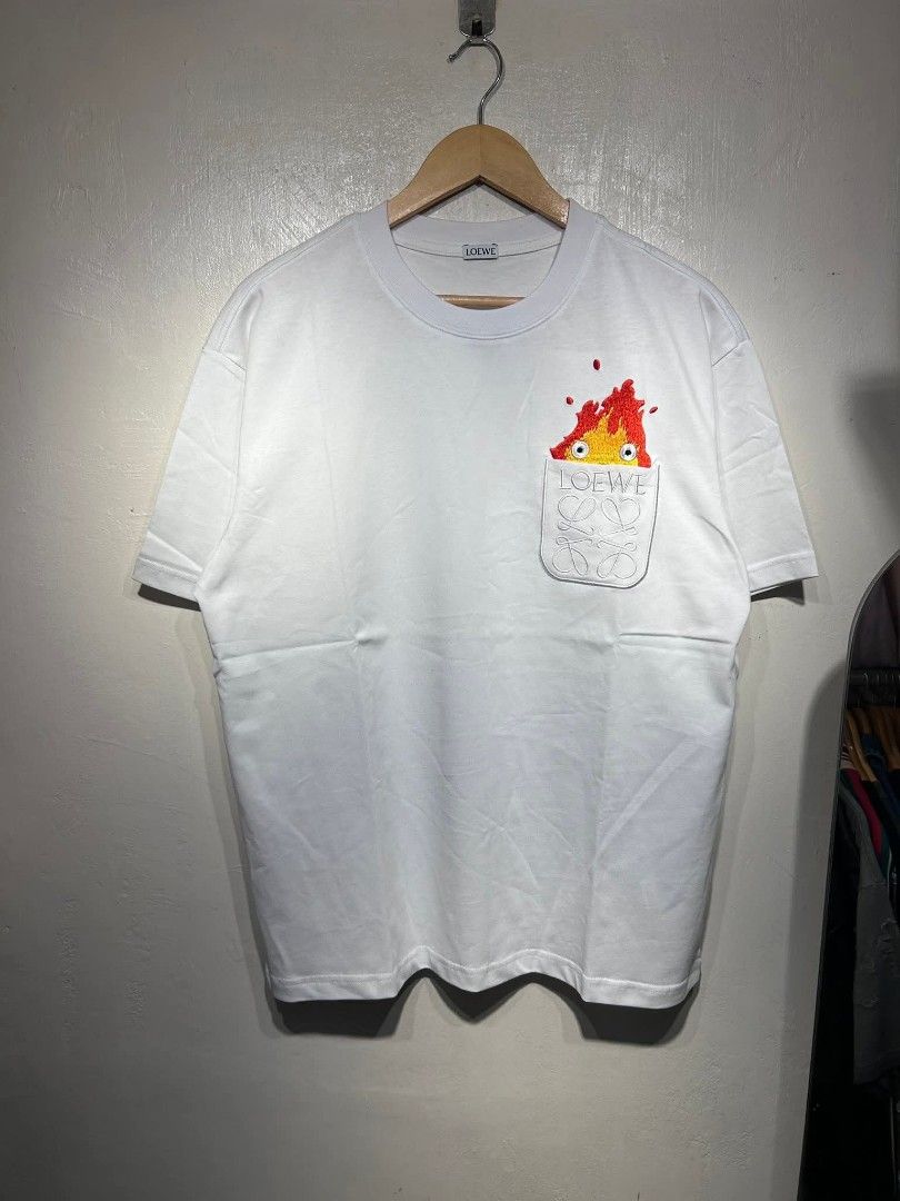 Loewe x Spiritted Away Pocket Tee. (Category: Tshirts & Polo Shirts ) located in Manila. Submitted by ardobe.mnl (Listing ID 1390718650, Image 1). Description: Loewe x Spiritted Away Pocket Tee. Size: Large Dimes: 22x28 Condition: Good asnew Flaw: None Dm for inquiries. 📥.