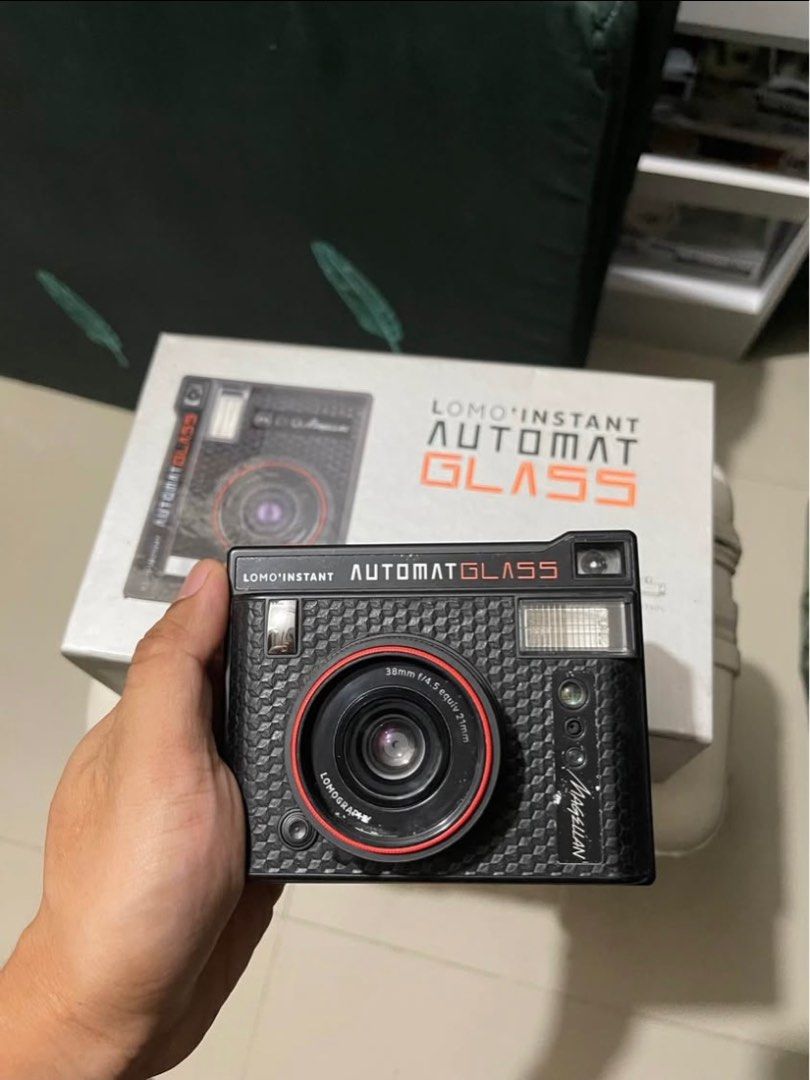LOMO INSTANT AUTOMATIC GLASS MAGELLAN (Category: Cameras) located in Quezon City. Submitted by rapsduino25-80075 (Listing ID 1390635392, Image 1). Description: Selling my LOMO INSTANT AUTOMATIC GLASS MAGELLAN For 5800 only. No issue, flash is also working Camera specs: Instant Film Format: Fujifilm Instax Mini Focal Length: 21 mm & Close-up Attachment Multiple Exposure: Yes Auto Exposure: Advanced Auto Exposure Available Apertures: f4.5, f22 Batt