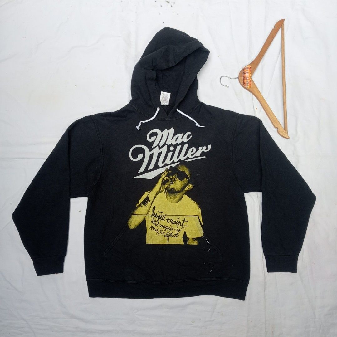 Mac Miller hoodie (Category: Hoodies) located in Pili. Submitted by purestuffph (Listing ID 1390699789, Image 1). Description: Mac Miller hoodie by Jerzees size: Medium width: 21 length: 25 color rate: 8/10 slight fade issue: white paint stain near pocket (check last pic) 750 + shipping fee.